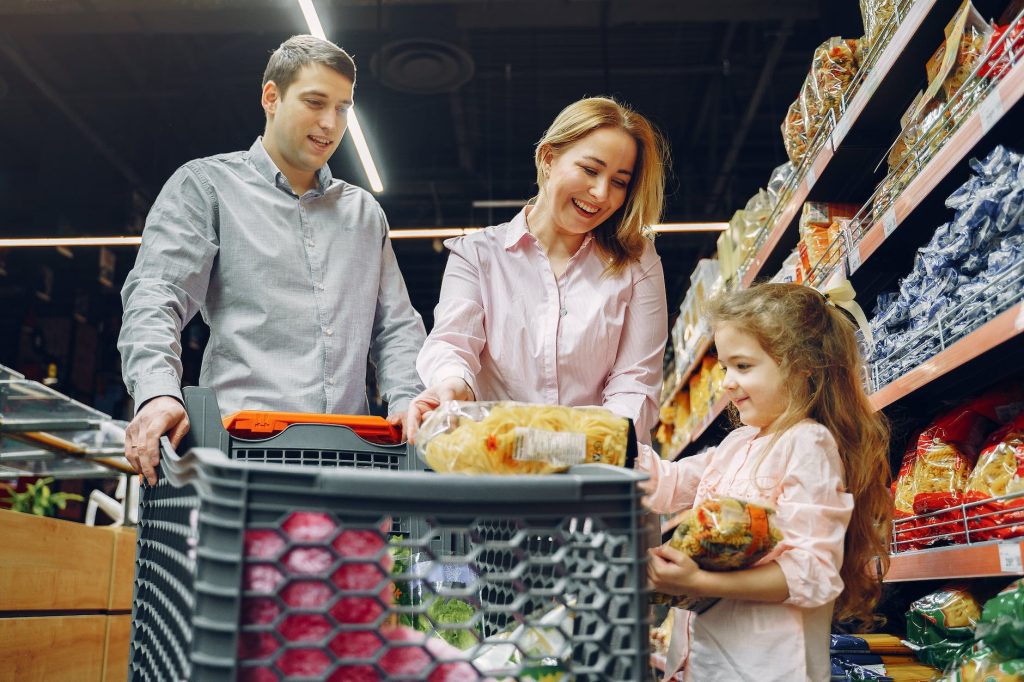 family doing grocery shopping