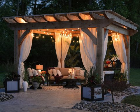 photo of gazebo with curtain and string lights