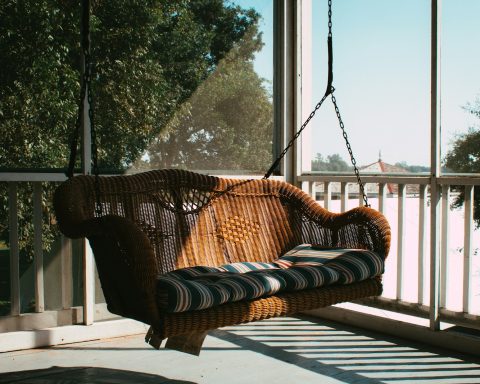 a hammock on a porch
