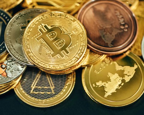 a pile of gold and silver bitcoins